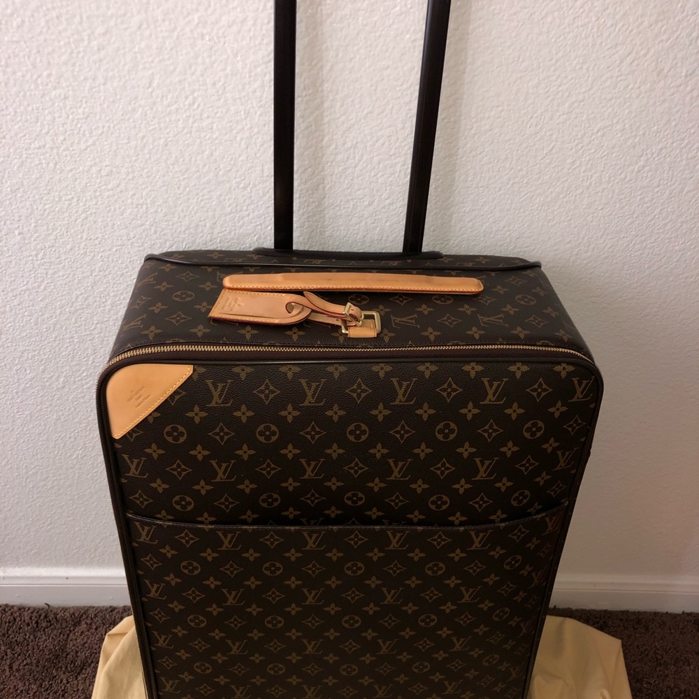 Authentic LV Monogram Pegase 70 rolling luggage .